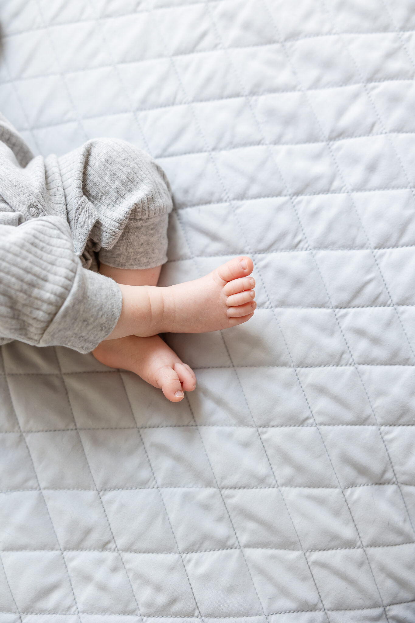 Close up image of babies feet during newborn photo session