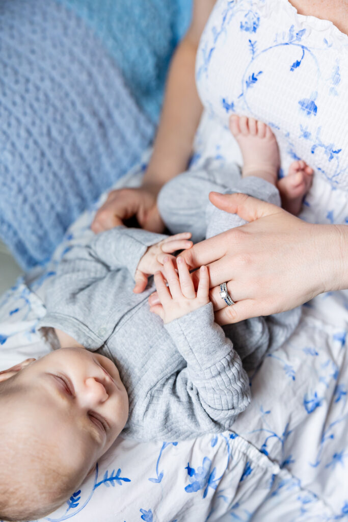 Mom and Newborn close up of hands