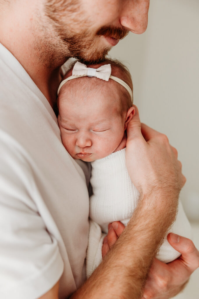 Photo of a newborn after gentle touch-up of baby skin